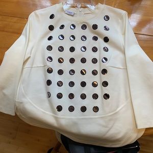 Very versatile Akris top with silver dots.